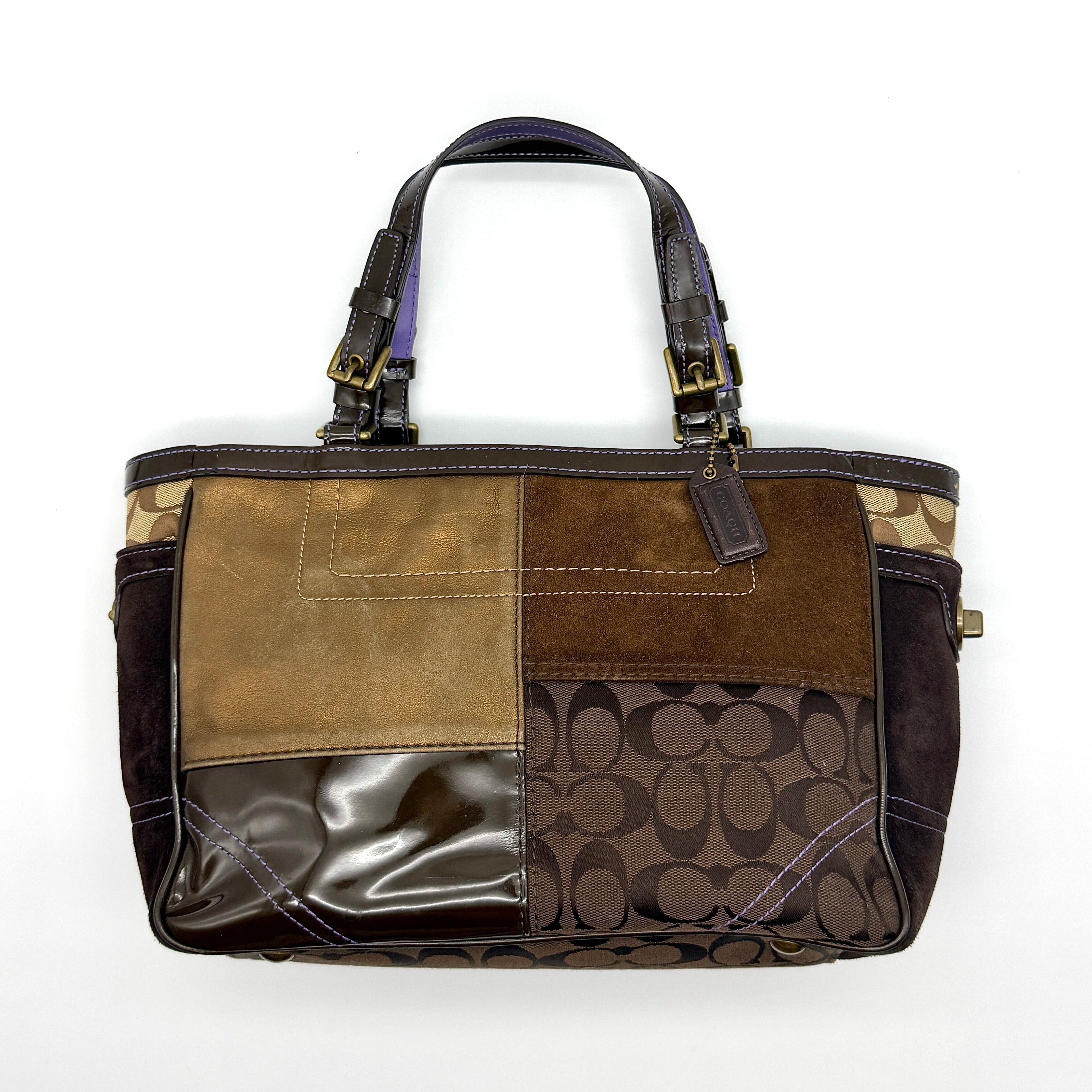 Coach Y2K Signature Patchwork Tote Bag in multi-brown with jacquard, suede, and patent leather panels, antique gold-tone hardware, and purple lining.
