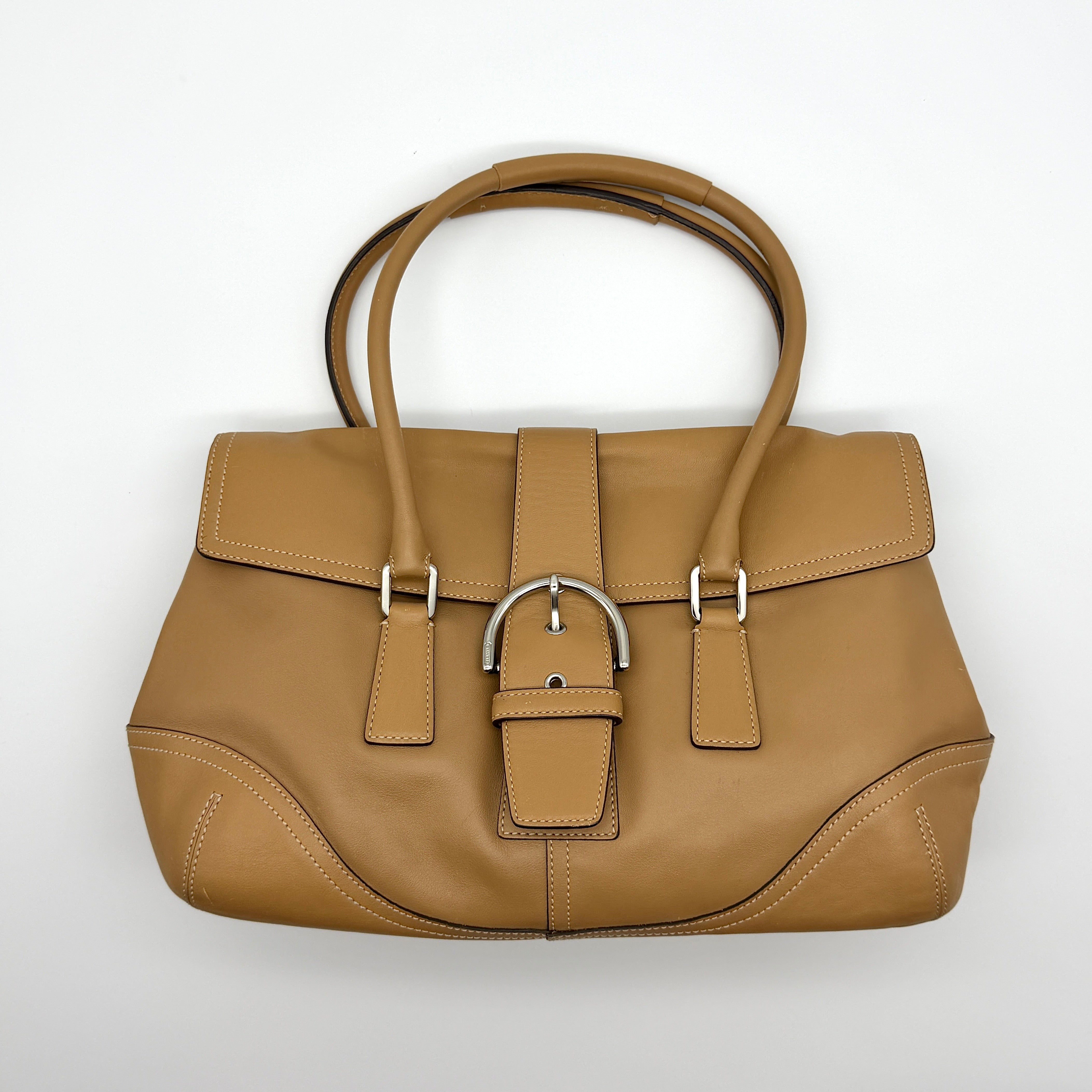 Coach Y2K Signature Soho Preloved Leather Shoulder Bag in tan brown with silver-tone buckle and structured silhouette.