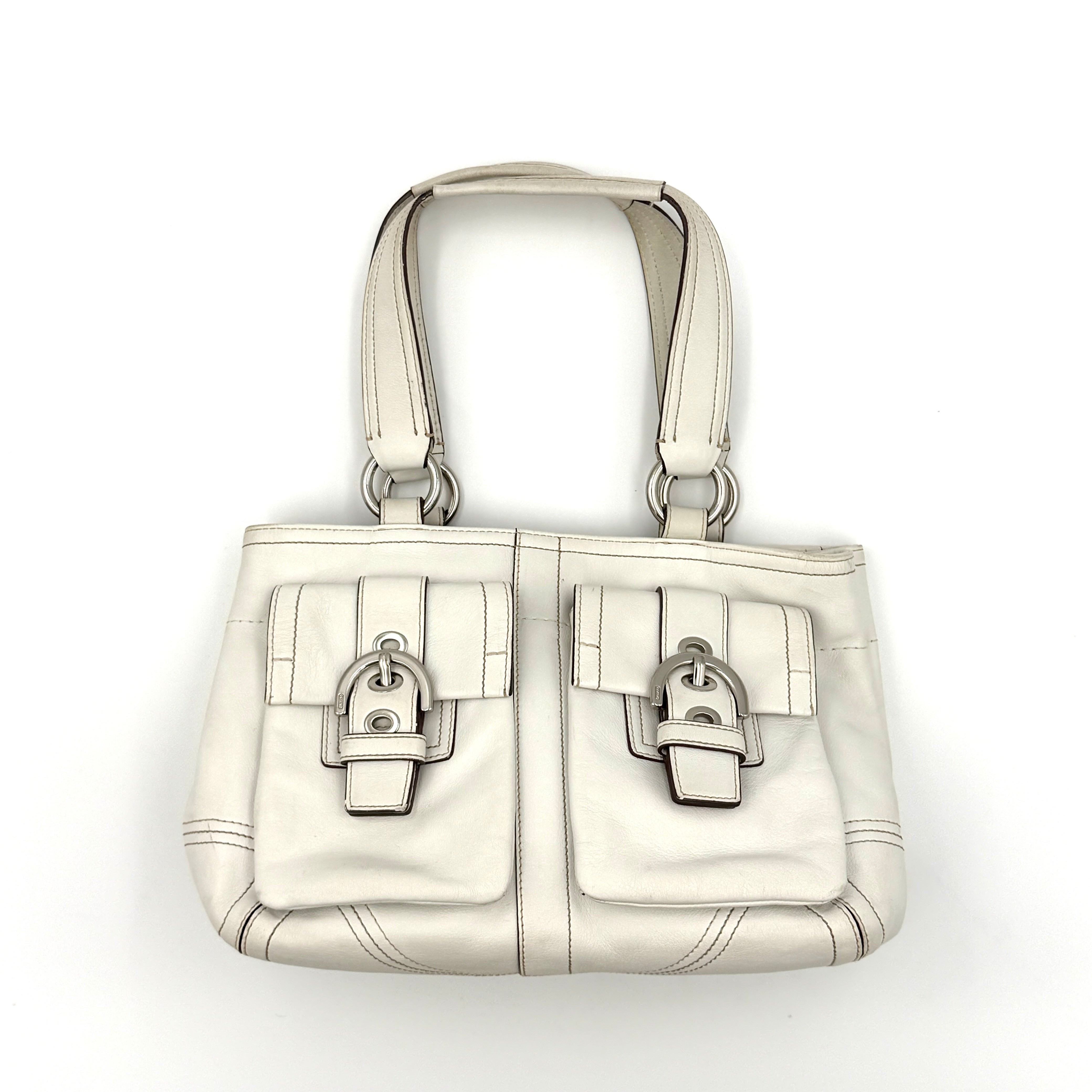 Coach Y2K Soho Double Mini Buckle Pocket Handbag in white leather with silver hardware, featuring dual front pockets, pre-loved luxury.