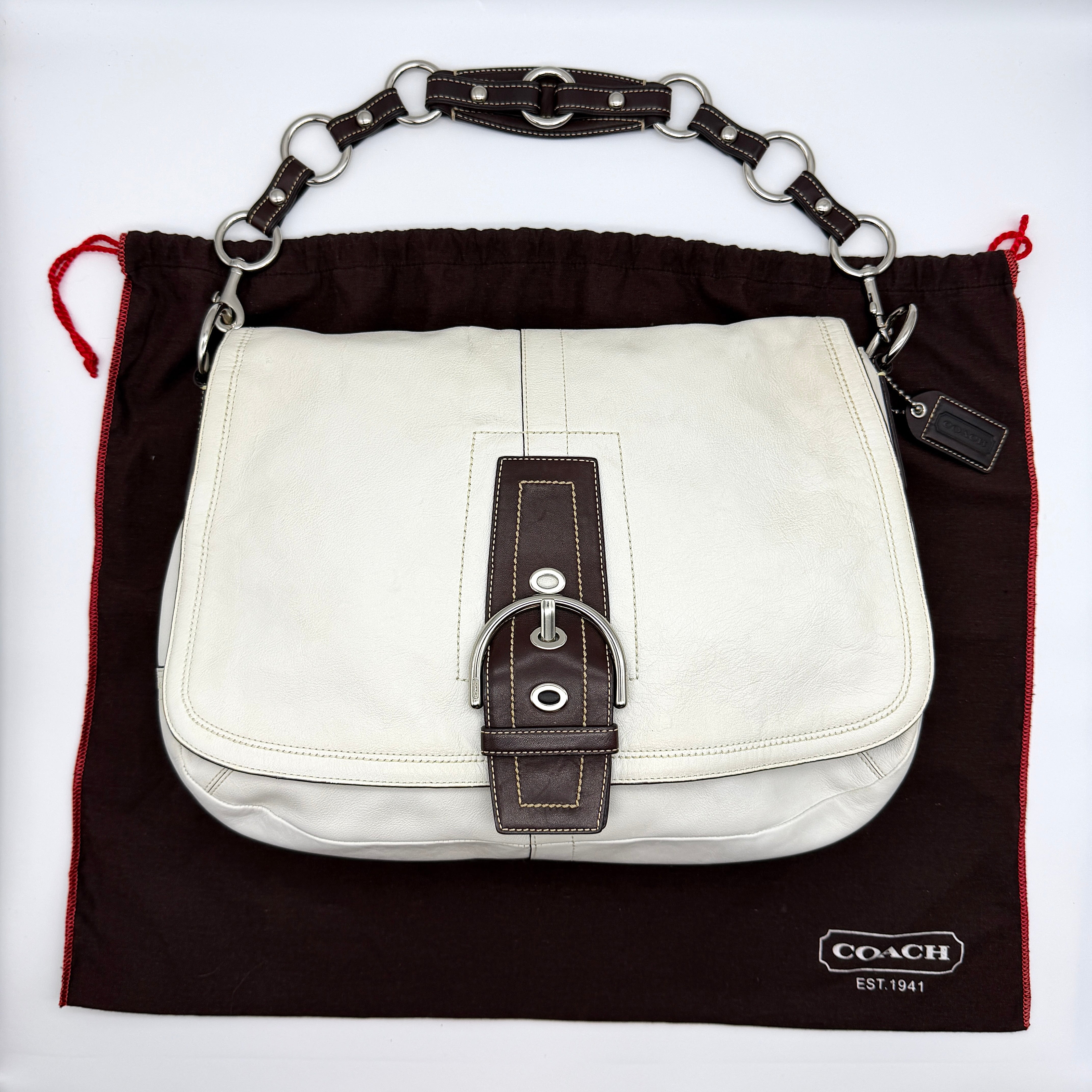 Coach Y2K Soho Preloved Luxury Shoulder Bag in white leather with brown trim and silver-tone hardware.