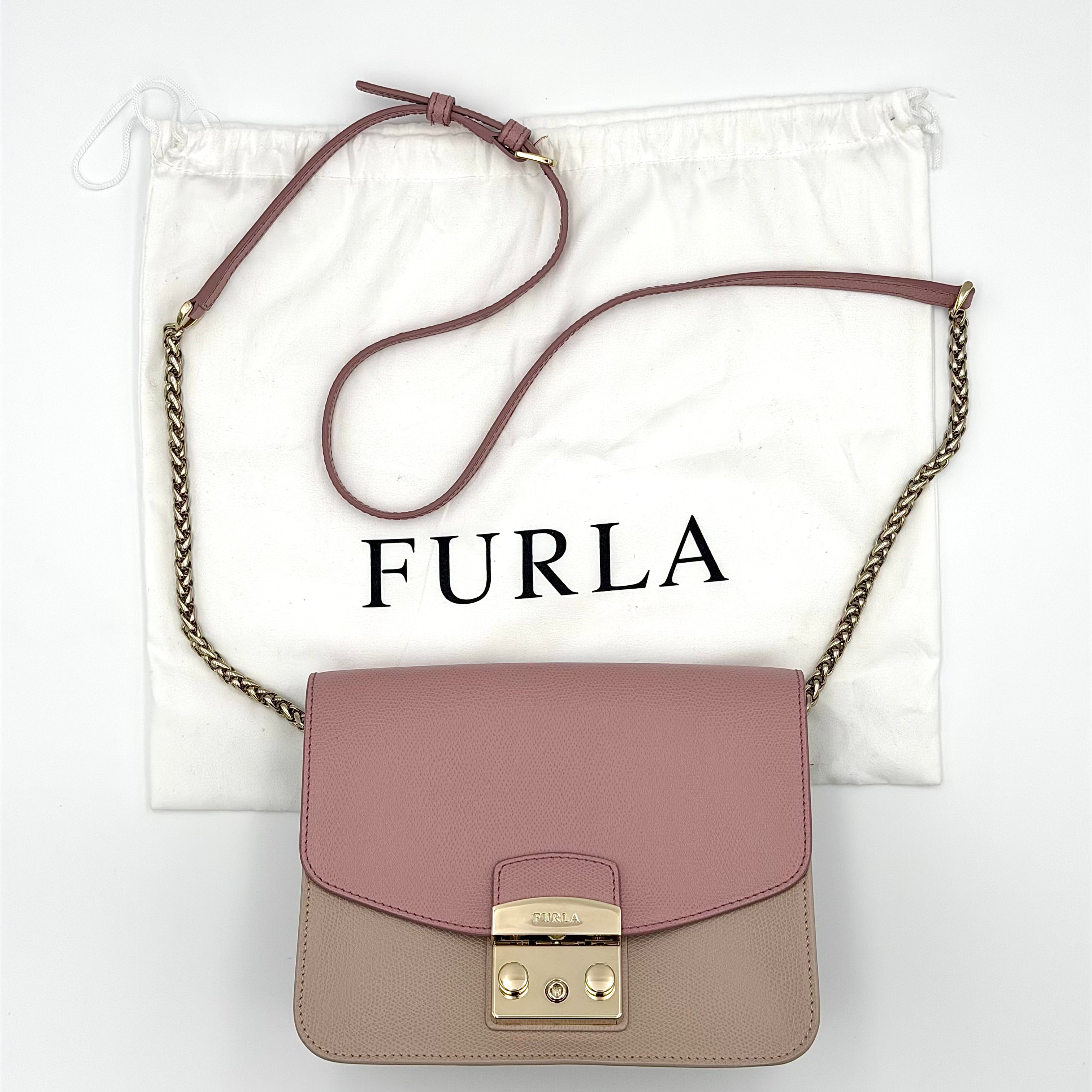 Furla Metropolis Bicolor Crossbody Bag in pink and beige textured leather with gold-tone lock and chain strap.