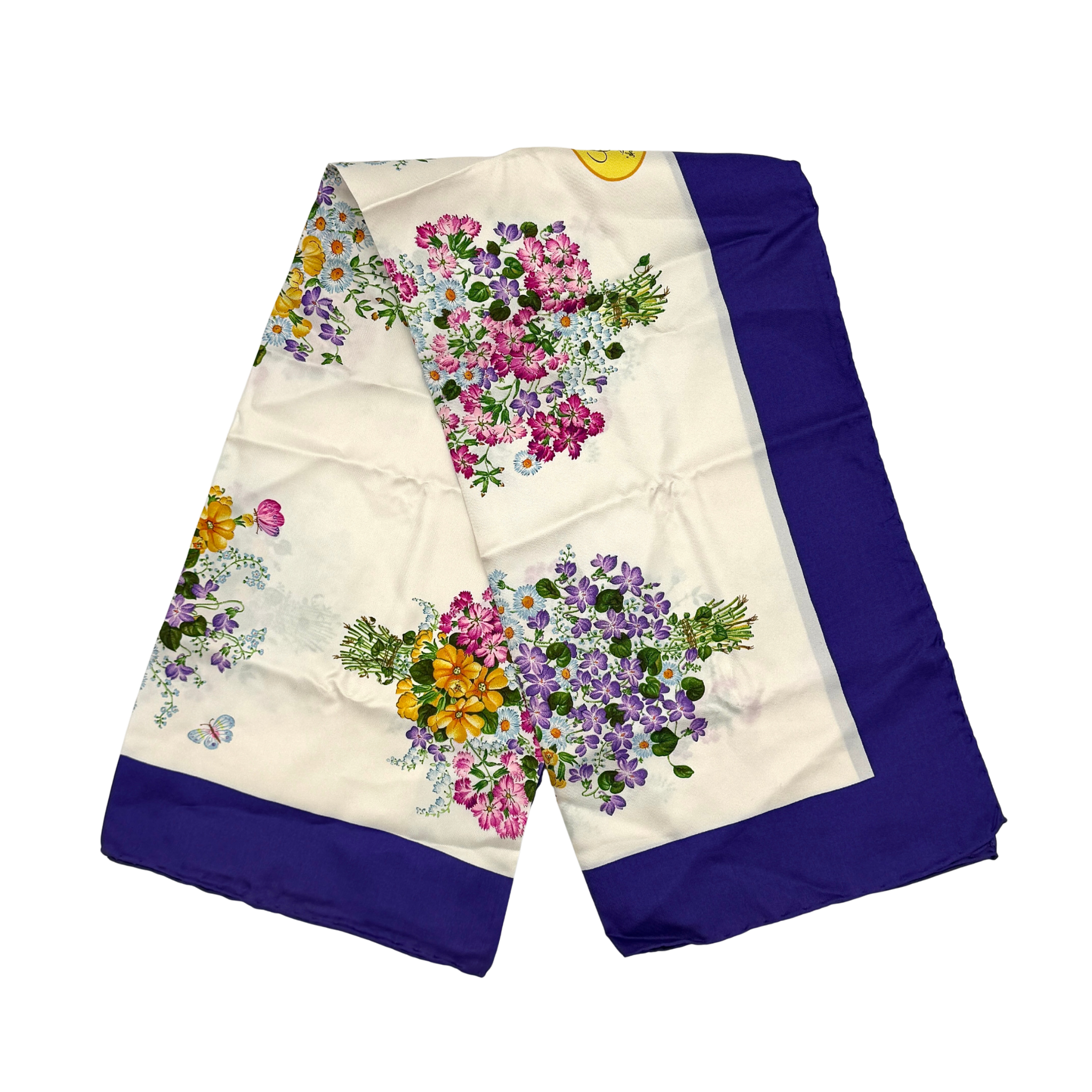 Gucci Flora silk scarf in blue multicolor featuring a vibrant floral pattern and rich blue border, showcasing luxury silk texture.