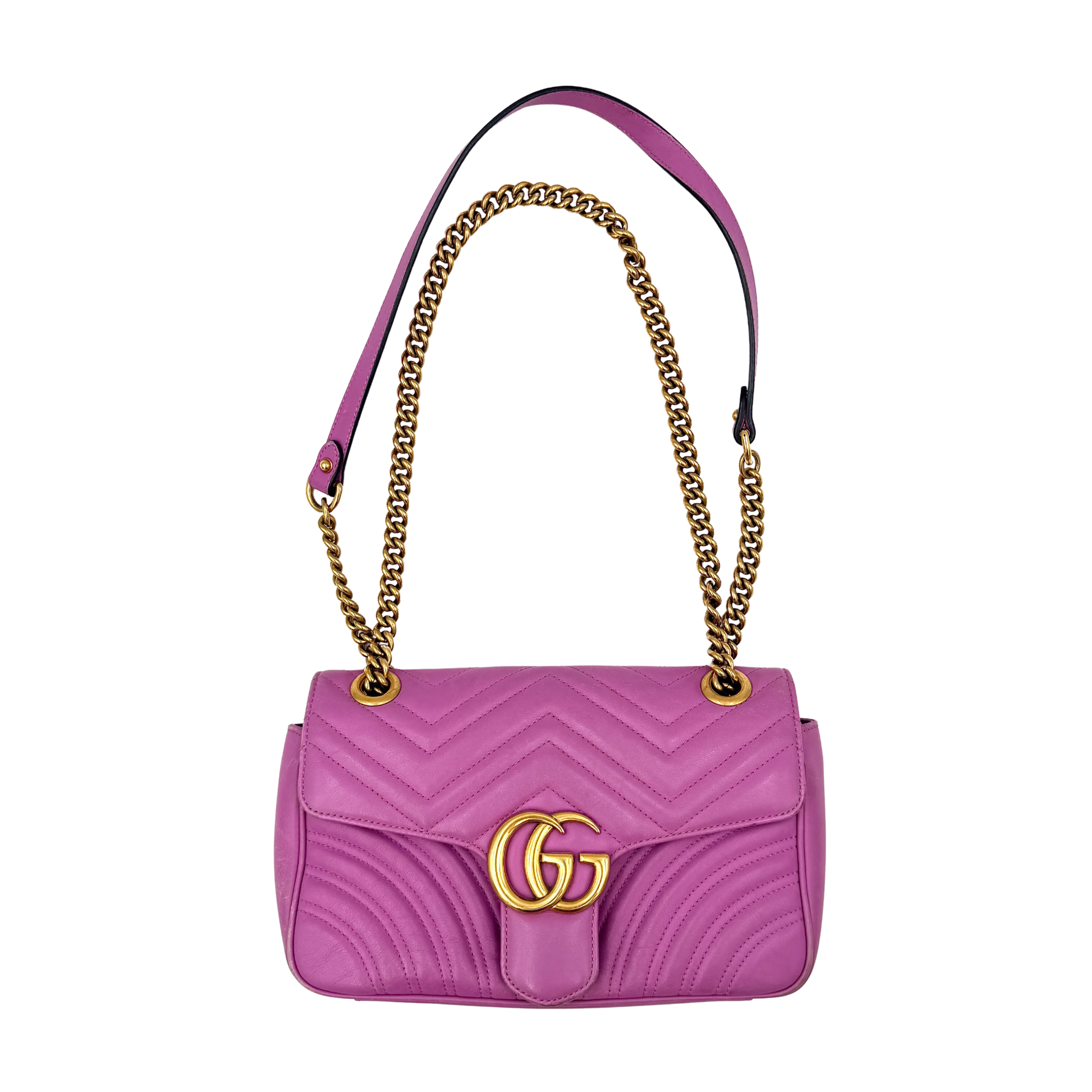Gucci GG Marmont matelassé leather shoulder bag in pink with GG logo and chain strap.