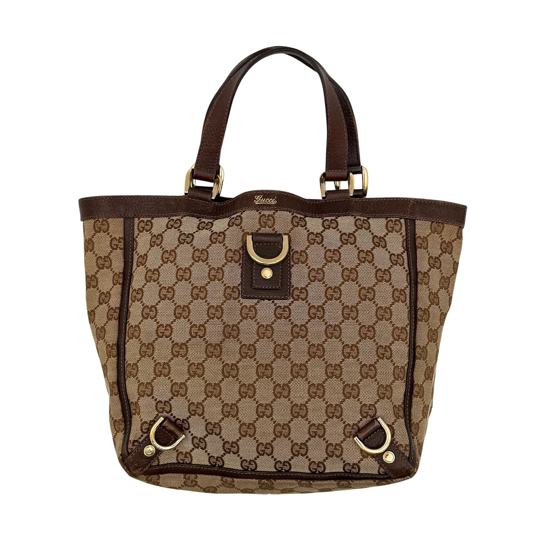 Gucci GG Monogram Abbey D-Ring Tote Bag in beige and brown with iconic monogram pattern, leather accents, and D-ring detail