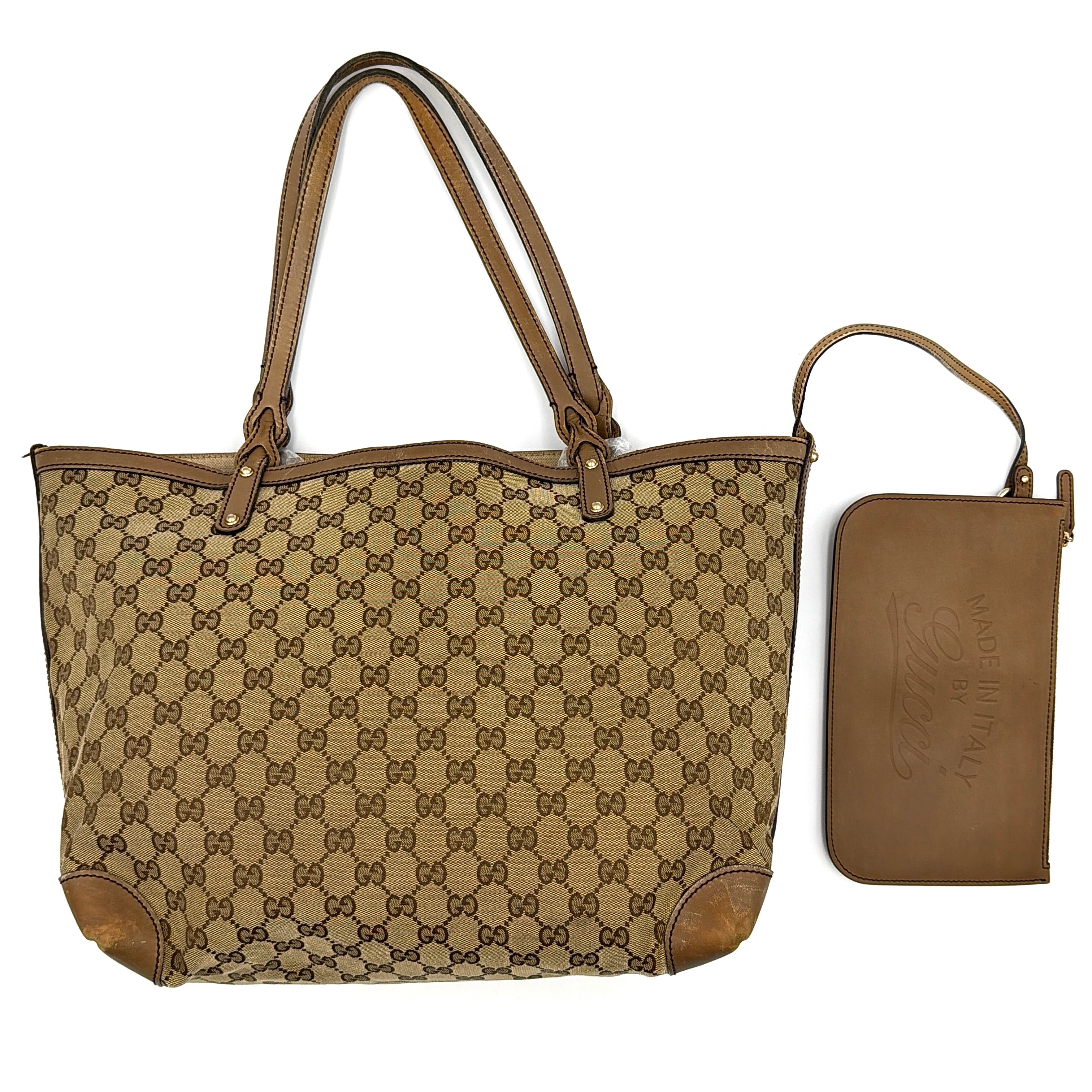 Gucci GG Monogram Craft Shoulder Bag in beige canvas with brown leather trim and detachable pouch.
