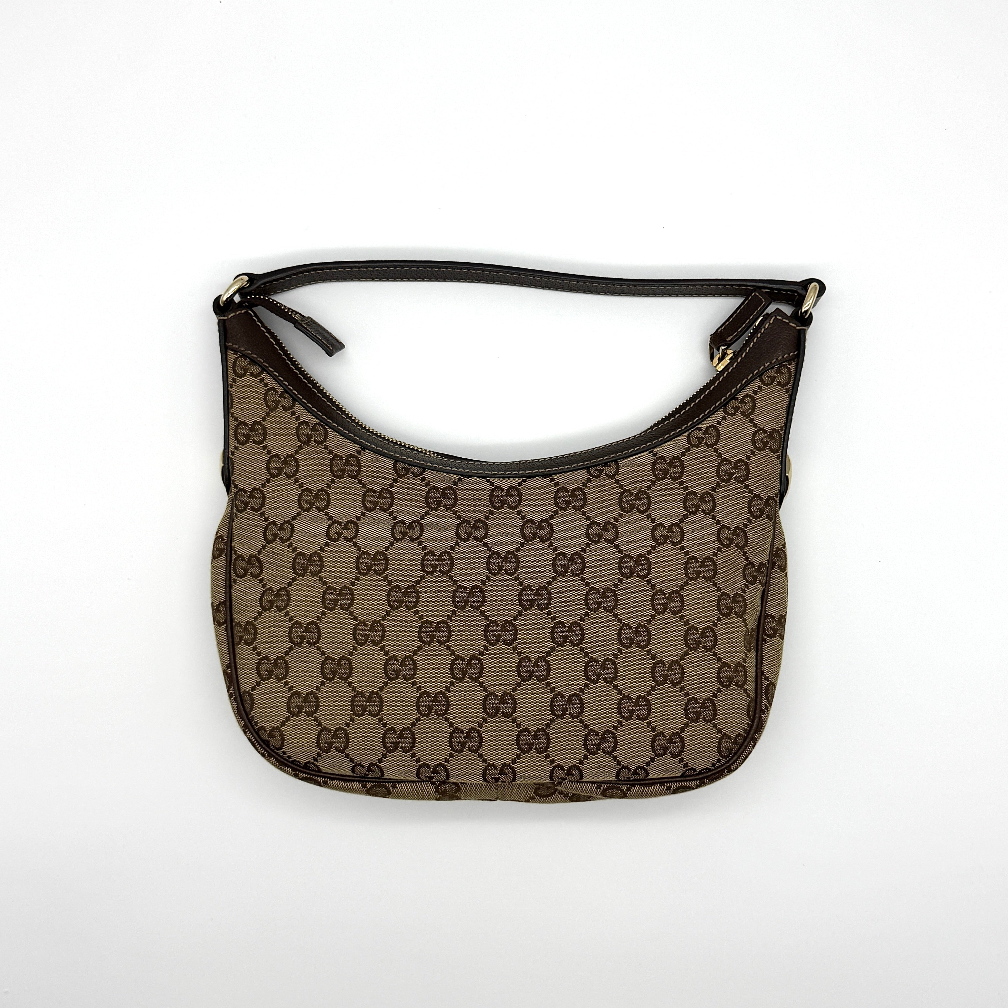 Gucci GG Monogram Hobo Shoulder Bag in beige and brown canvas with gold-tone hardware and leather trim.