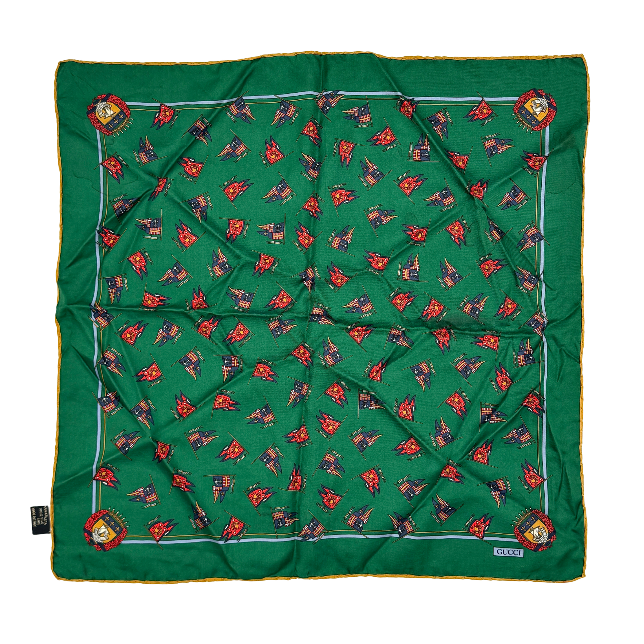 Gucci green silk pocket square featuring a detailed pattern and contrasting border, showcasing luxurious craftsmanship.