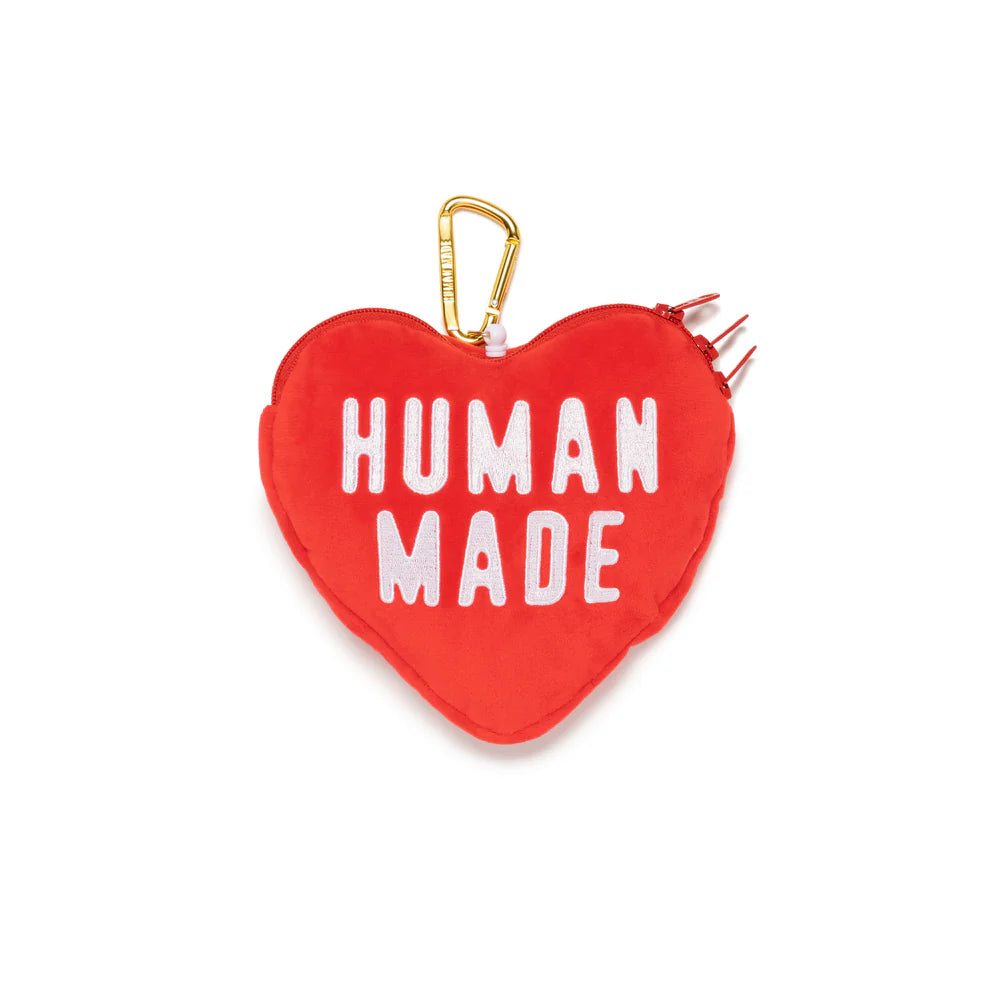 Human Made red heart pass case with bold white lettering and gold clasp attachment.
