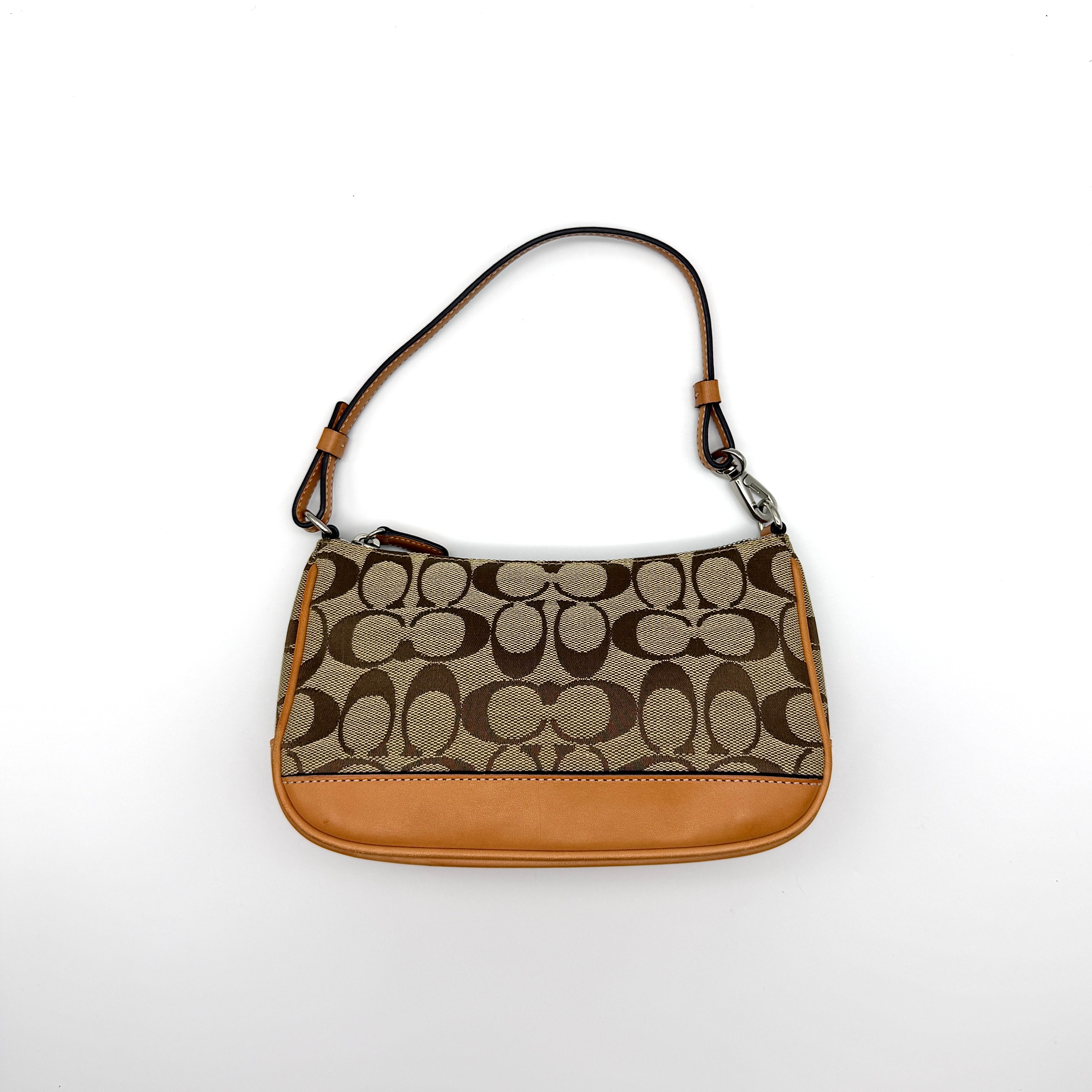 Coach Y2K Demi Shoulder Bag in signature canvas with tan leather trim and red fabric interior.