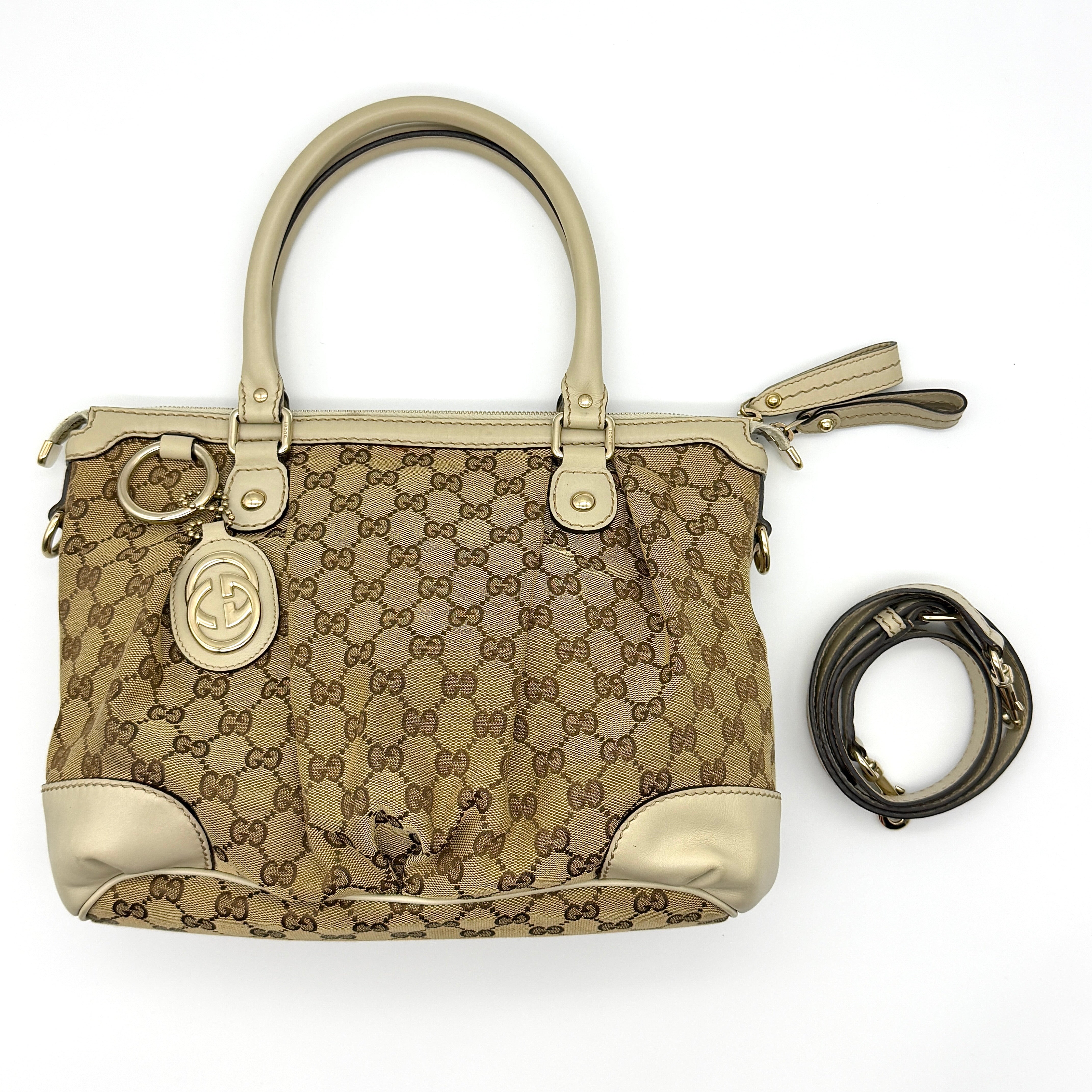 Gucci 2Way GG Monogram Sukey Shoulder Bag in beige canvas with white leather trim, gold-tone hardware, and detachable strap