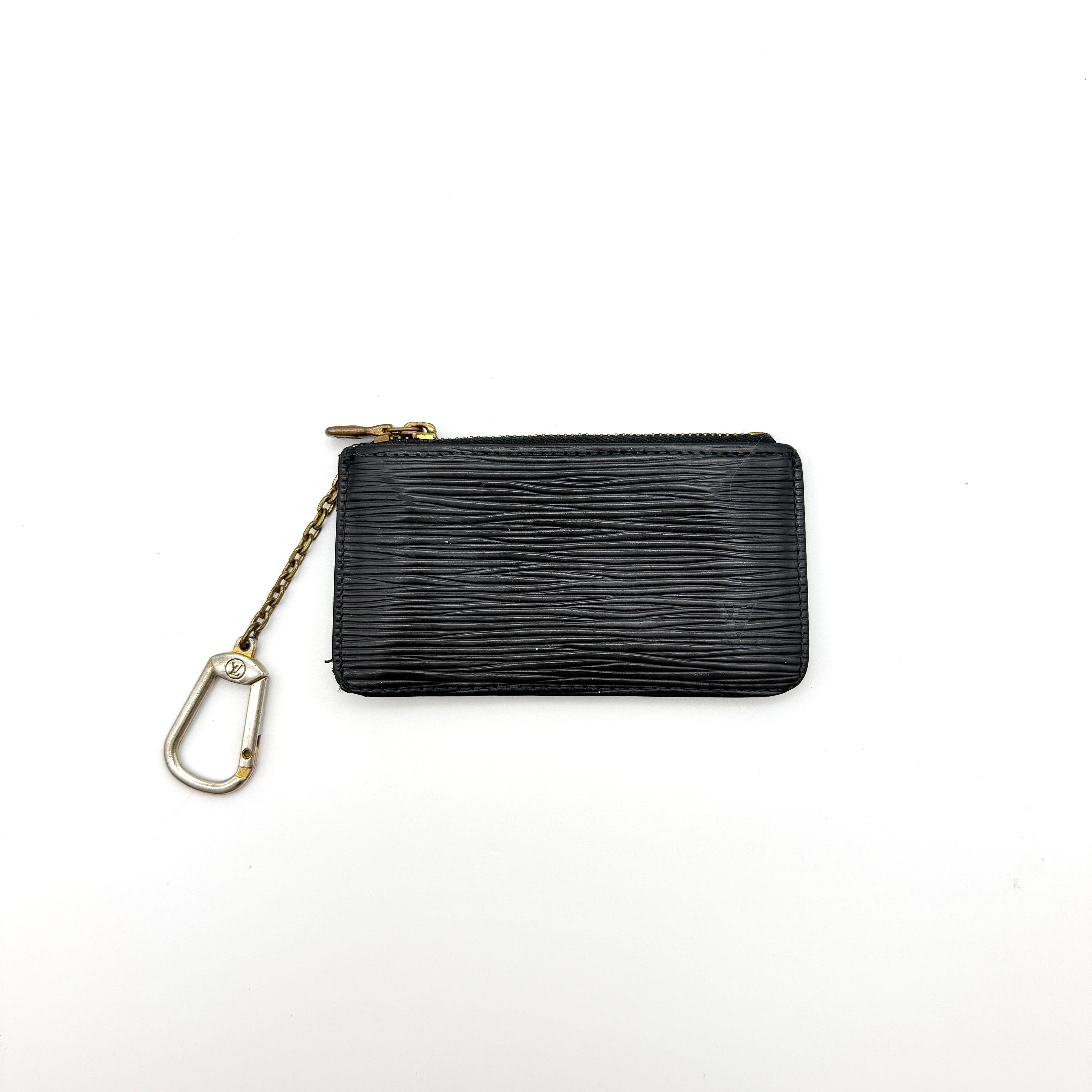 Louis Vuitton Epi Leather Coin Purse in black textured leather with gold-tone hardware and interior key chain clasp