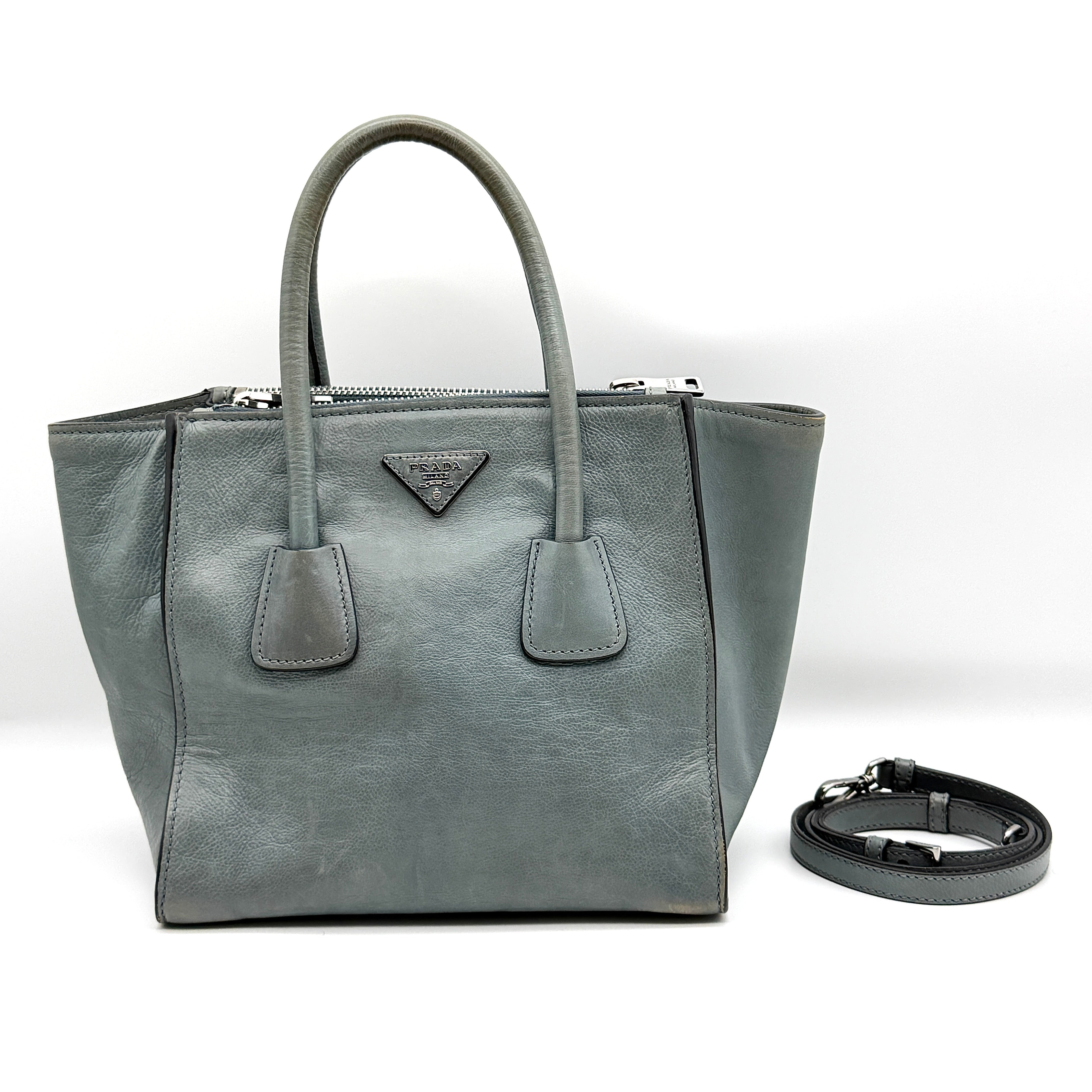 Prada 2Way Glace Twin Pocket Handbag in grey glazed leather with silver-tone hardware and detachable strap.