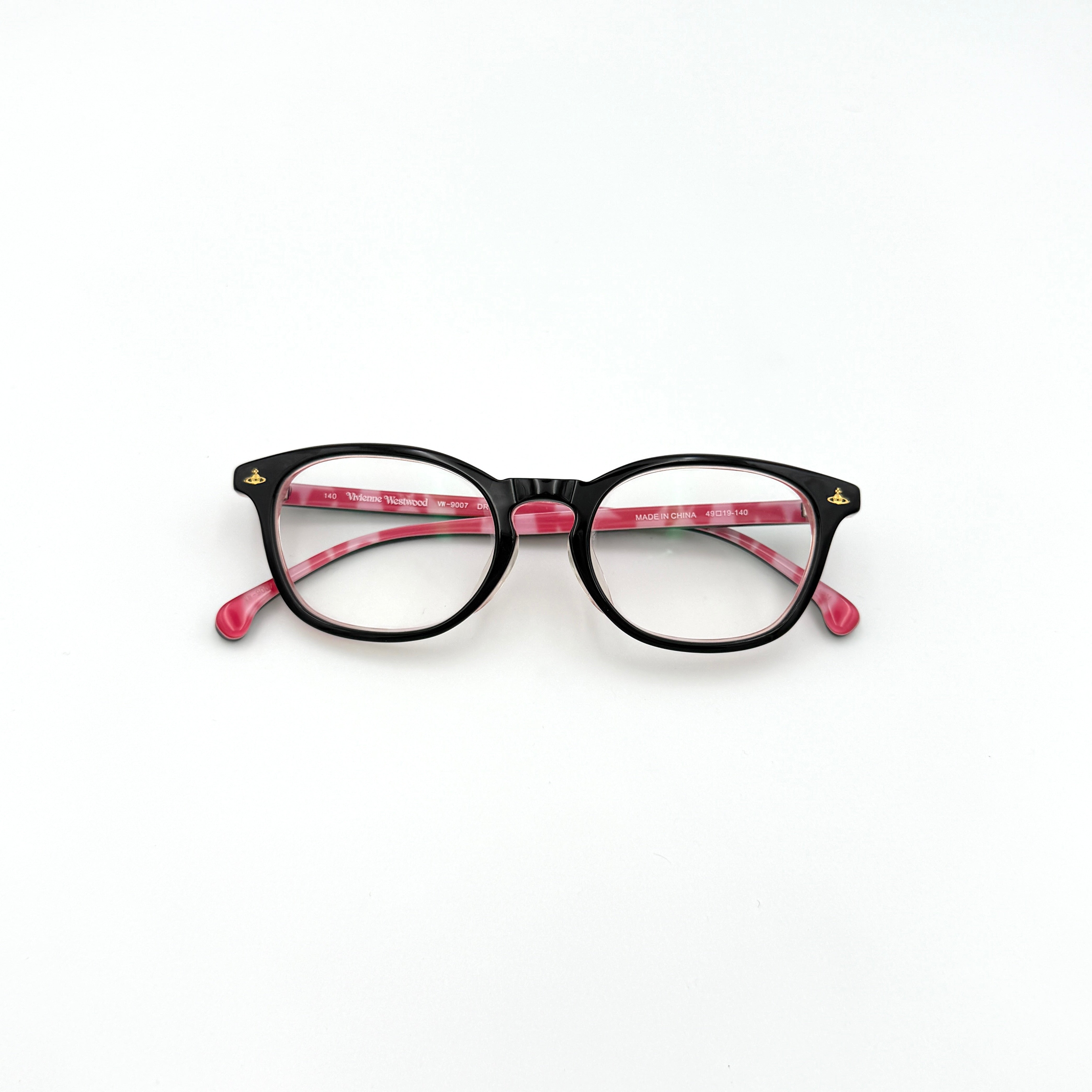 Vivienne Westwood VW-9007 Glasses with black front and pink marbled interior, featuring gold-tone Orb logos on the temples.