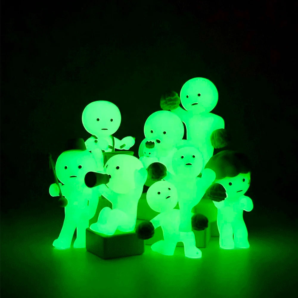 Smiski collectible figure, glow-in-the-dark mini character in quirky poses, perfect for shelves and desks.