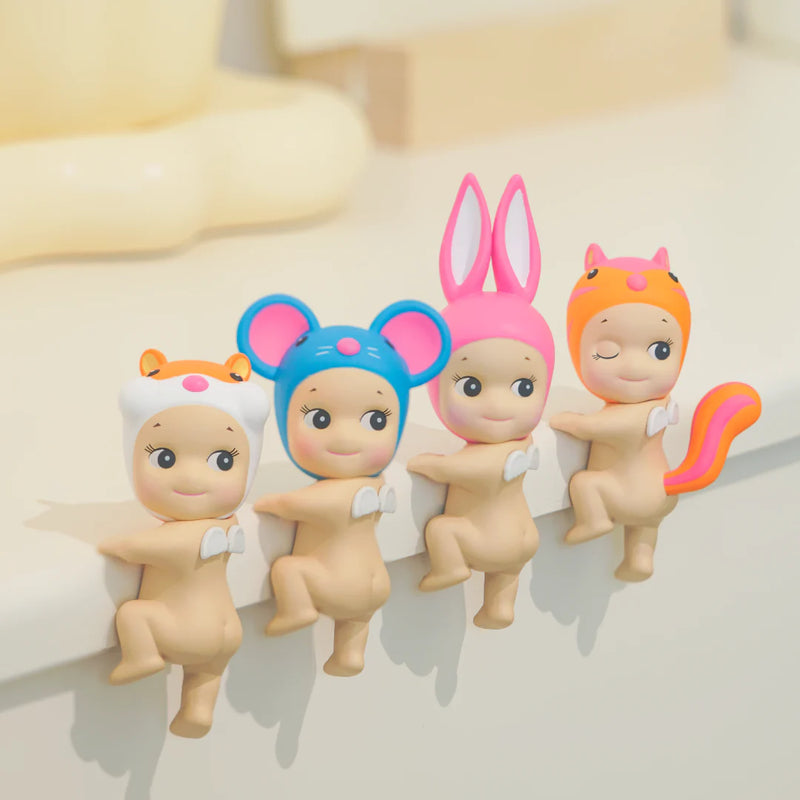 Sonny Angel collectible figure from Hippers Looking Back Series, featuring a charming mini angel design with themed headgear.