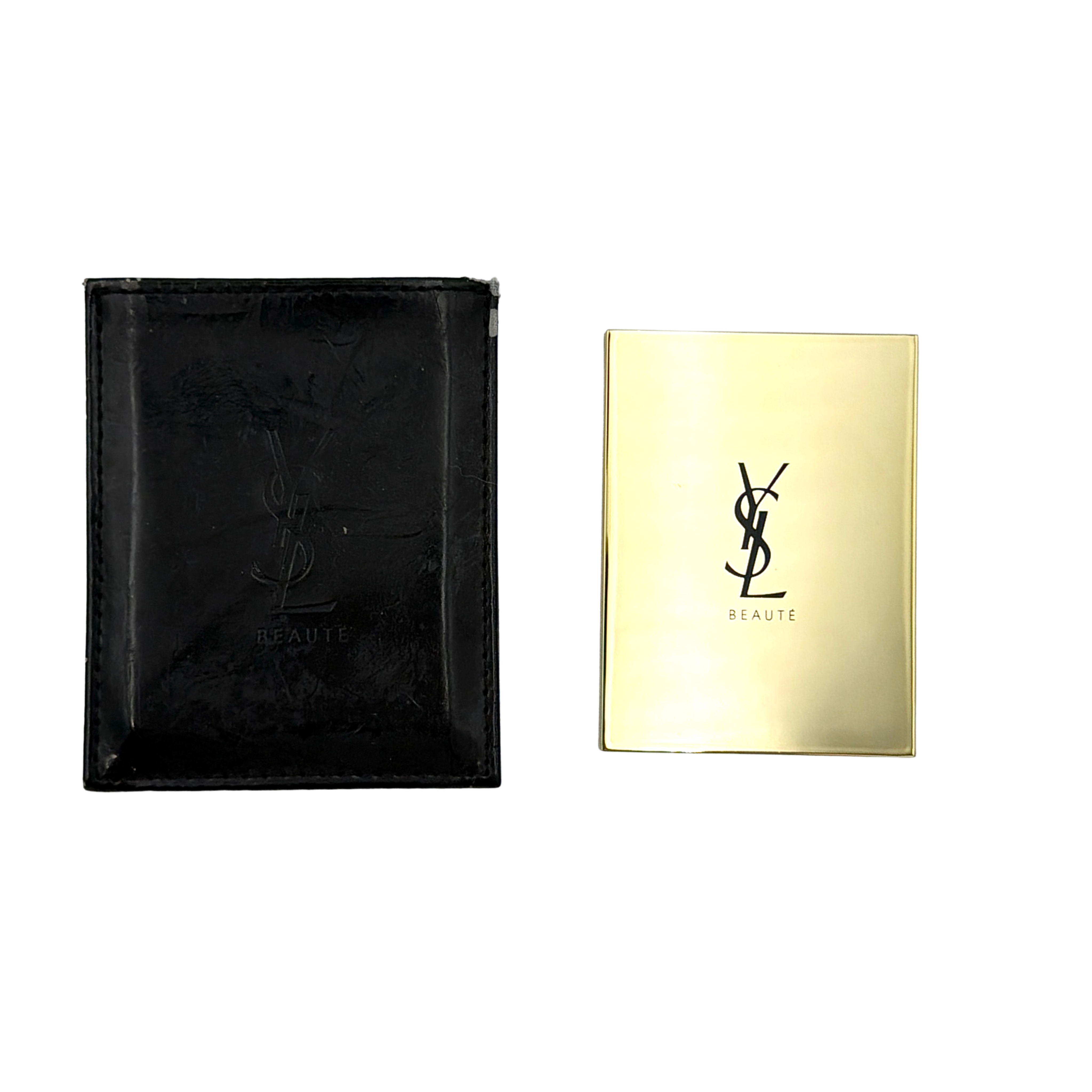 Saint Laurent YSL Beauté gold compact mirror with YSL logo, shown with black sleeve and reflective back.
