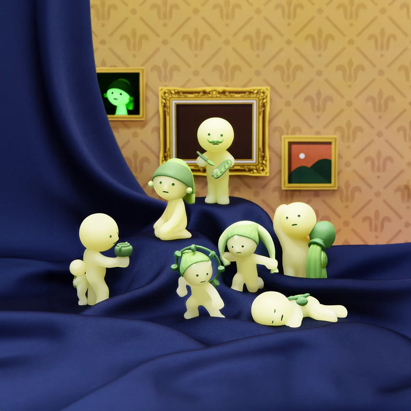 Smiski collectible figure, glow-in-the-dark mini character in quirky poses, perfect for shelves and desks.