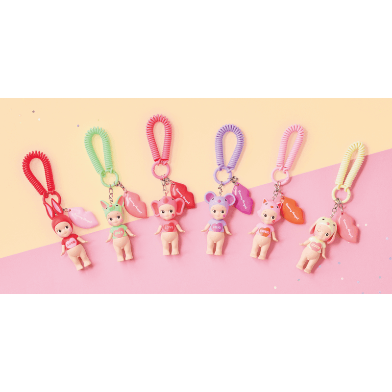 Sonny Angel collectible figure from Kiss Kiss Series, featuring a charming mini angel design with themed headgear.